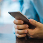 man-consulting-mobile-phone-637435389710498361_Large.jpg